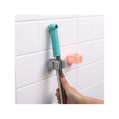 Wall holder for utensils